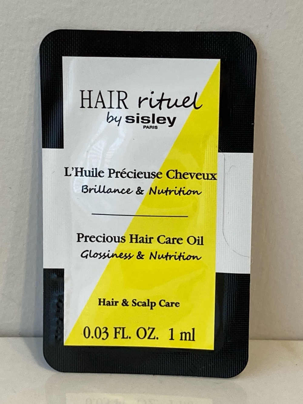 5/$25 Sisley Hair Rituel Precious Hair Care Oil 1ml